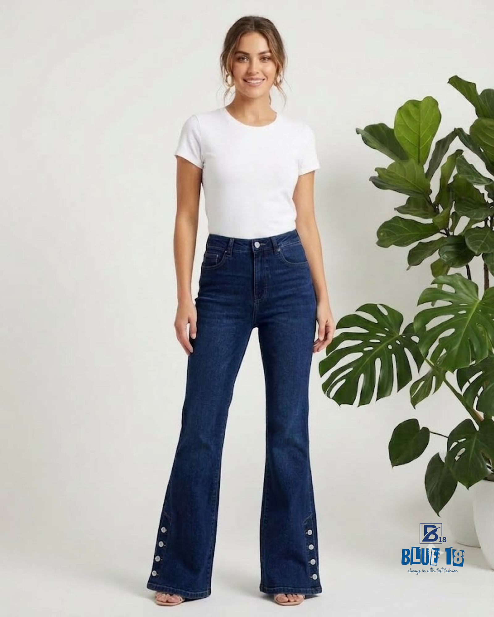 Women’s Mid Blue Flared Jeans with Bottom Button Detail