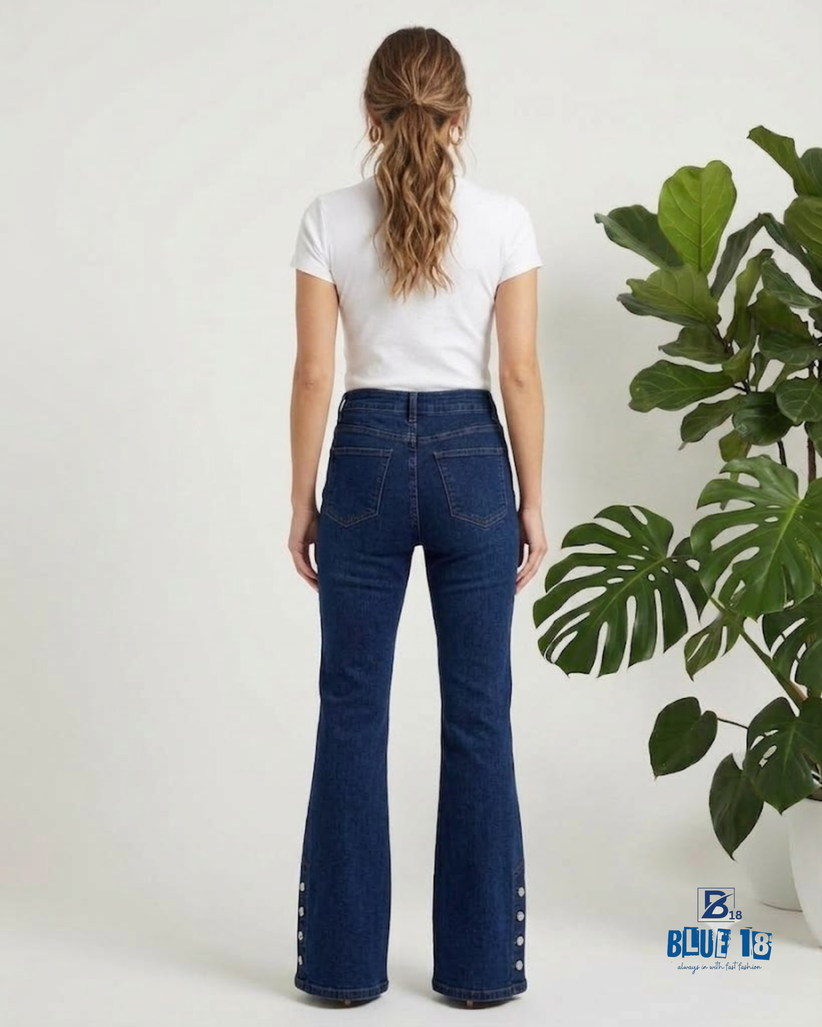 Women’s Mid Blue Flared Jeans with Bottom Button Detail